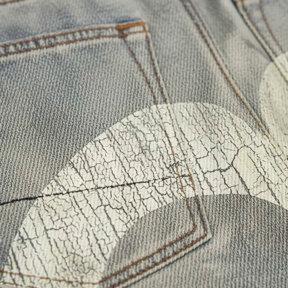 BLEACHED DISTRESSED DAICOCK JEANS